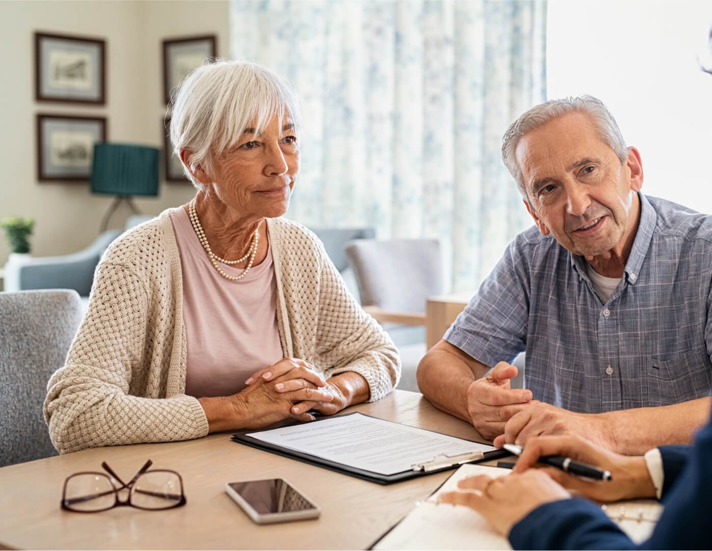 Senior couple discussing healthcare options